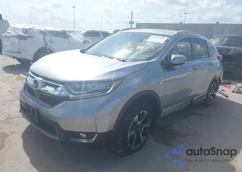 2018 Honda Cr-V Touring z USA, uszkodzony, nr VIN 7FARW1H93JE001455